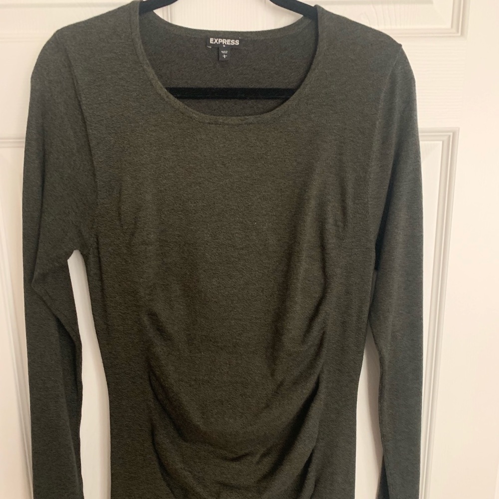 Green long sleeve woman’s dress.